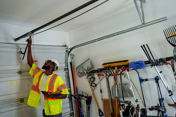 Professional Garage Door Panel Replacement technician working in Celoron, NY